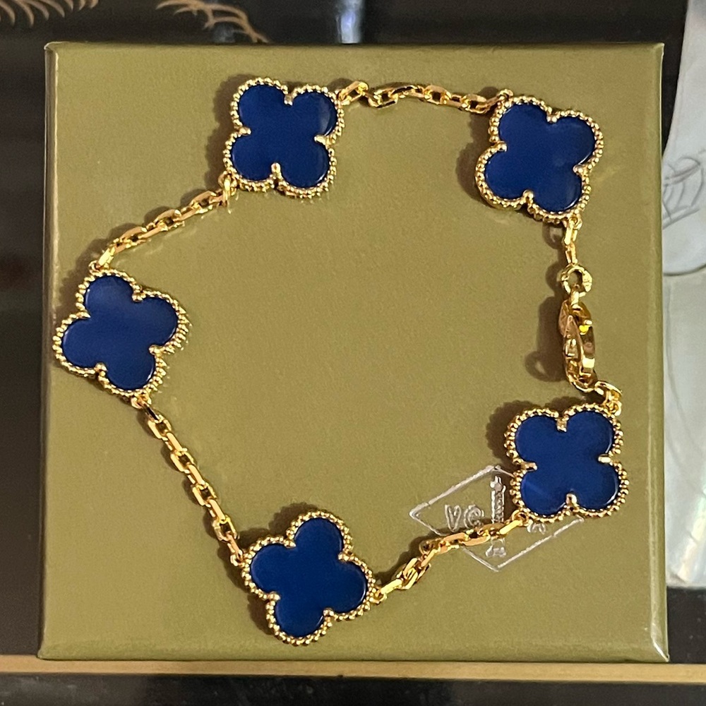 Elegant Gold and Blue Clover Bracelet